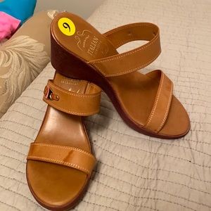 Italian leather strap wedge sandal.